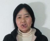 Gđa Liu Yongying nakon što je dvije godine teško trpjela zlostavljanje 