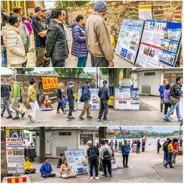 Turisti proučavaju informacije o Falun Gongu 