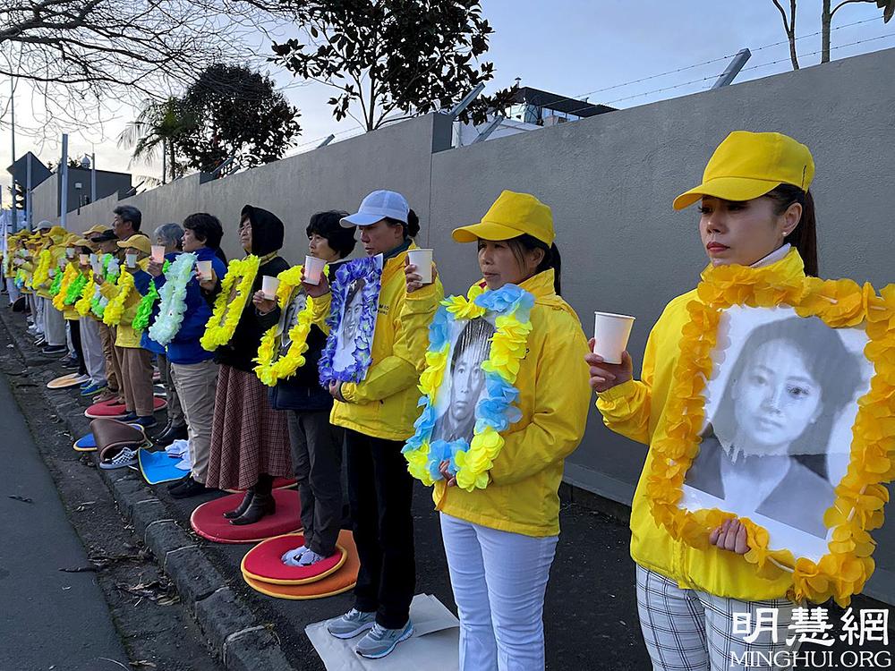 Bdijenje uz svijeće ispred kineskog konzulata u Aucklandu 20. srpnja
 