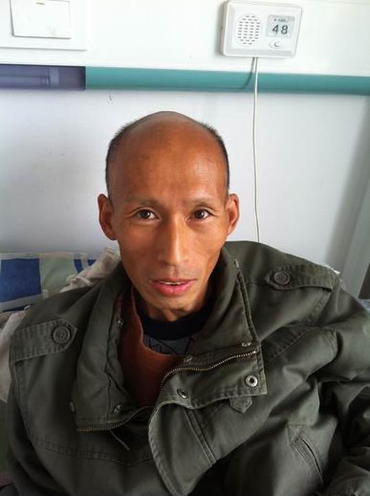 G. Huo Jinping je upućen u bolnicu nakon što je bio mučen u centru za ispiranje mozga.