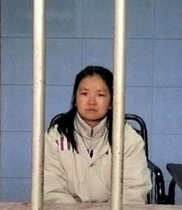 Fotografija gđe. Li Li zatvorene  u pritvorskom centru.
