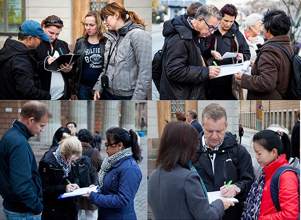 Ljudi potpisuju peticiju kako bi pokazali svoju potporu Falun Gongu