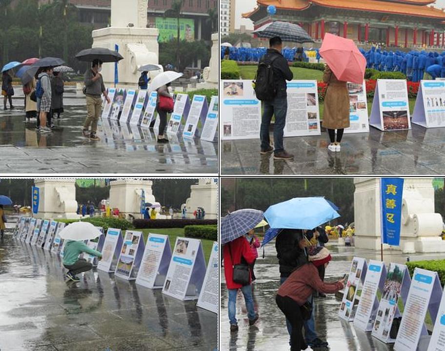  Kineski turisti gledaju Falun Gong plakate